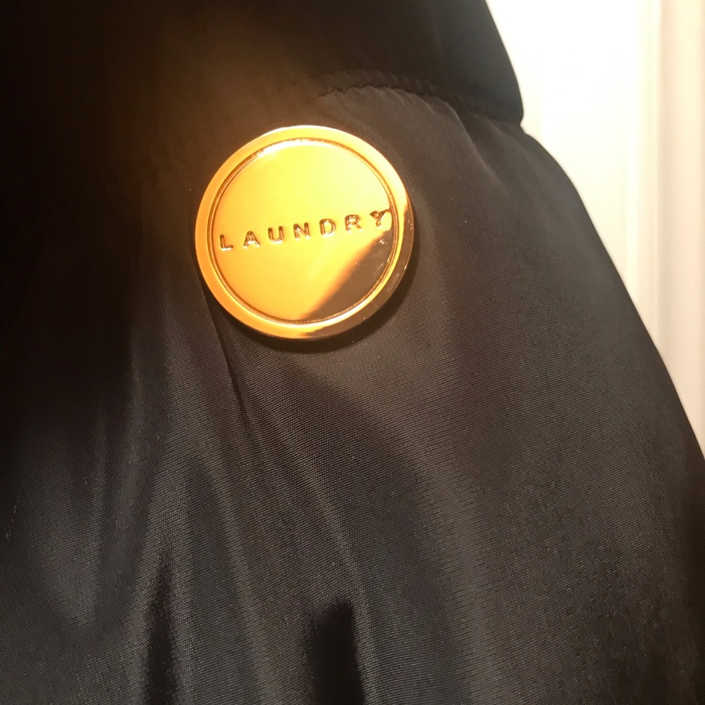 Coat by laundry